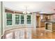 Eat-in kitchen area with bay window and granite counters at 8464 Pleasant Hill Rd, Lithonia, GA 30058