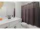 Clean bathroom with a modern vanity, white countertop, and simple fixtures at 124 Calder Dr, Alpharetta, GA 30009