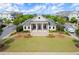 Community clubhouse, Harlow Hall, featuring a manicured lawn and inviting entrance perfect for gatherings at 124 Calder Dr, Alpharetta, GA 30009