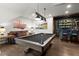 Bright game room with a pool table, a wet bar, and ample space for entertaining at 124 Calder Dr, Alpharetta, GA 30009