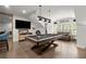 Inviting game room offering a pool table, TV area, and relaxing atmosphere at 124 Calder Dr, Alpharetta, GA 30009