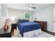 Bright bedroom with windows, drawers, and a cute dinosaur figurine on display at 3036 Horse Shoe Se Dr, Atlanta, GA 30316