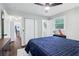 Cozy bedroom with ceiling fan, double closet, and windows for ample natural light at 3036 Horse Shoe Se Dr, Atlanta, GA 30316