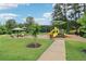 The community playground features slides, climbing structures, and shaded areas for to enjoy at 3036 Horse Shoe Se Dr, Atlanta, GA 30316