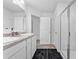 Bright bathroom featuring a tiled shower, and double vanity with ample countertop space at 5668 Union Pointe Dr, Union City, GA 30291