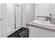 Bright bathroom featuring a tiled shower, and double vanity with ample countertop space at 5668 Union Pointe Dr, Union City, GA 30291