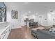 Open-concept living space with modern kitchen, spacious living area, and hardwood floors for seamless living at 5668 Union Pointe Dr, Union City, GA 30291