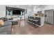 Open-concept living space with modern kitchen, spacious living area, and hardwood floors for seamless living at 5668 Union Pointe Dr, Union City, GA 30291