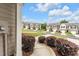 Street view of townhomes showcases a well-maintained community with attractive curb appeal and landscaping at 5668 Union Pointe Dr, Union City, GA 30291