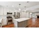 This newly updated kitchen has white cabinetry, stainless steel appliances, and a large island at 1245 S Ponce De Leon Ne Ave # 13, Atlanta, GA 30306