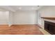 Bright living room showcasing hardwood floors, a fireplace, and plenty of natural light at 1245 S Ponce De Leon Ne Ave # 13, Atlanta, GA 30306