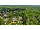 Expansive aerial view showcasing the neighborhood with lush greenery and beautiful homes at 3639 Paper Mill Se Rd, Marietta, GA 30067