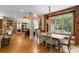 Elegant dining room with hardwood floors, natural light, and an adjoining living space at 3639 Paper Mill Se Rd, Marietta, GA 30067