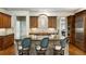 Gourmet kitchen featuring a large island, custom cabinetry, and stainless steel appliances at 3639 Paper Mill Se Rd, Marietta, GA 30067