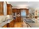 Modern kitchen with stainless steel appliances, granite countertops, and custom wood cabinets at 3639 Paper Mill Se Rd, Marietta, GA 30067