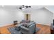Cozy living room with hardwood floors and a comfortable sectional sofa at 3639 Paper Mill Se Rd, Marietta, GA 30067