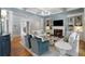 Bright living room with hardwood floors, fireplace, and built-in bookshelves at 3639 Paper Mill Se Rd, Marietta, GA 30067