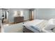 Bright and airy main bedroom features hardwood floors and neutral decor at 3639 Paper Mill Se Rd, Marietta, GA 30067