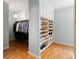 Bright walk-in closet has hanging racks, shelves and space for shoes and accessories at 3639 Paper Mill Se Rd, Marietta, GA 30067