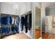 Spacious walk-in closet with custom shelving and hanging racks for clothes and shoes at 3639 Paper Mill Se Rd, Marietta, GA 30067