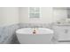 Bathroom showcasing a standalone tub, marble shower, and granite sink at 3729 Meadow Glen Cir, Ellenwood, GA 30294