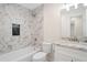 Bathroom showcasing a tub, marble shower, and granite sink at 3729 Meadow Glen Cir, Ellenwood, GA 30294