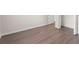 Hardwood floors in an empty bedroom at 3729 Meadow Glen Cir, Ellenwood, GA 30294