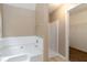 Main bathroom boasts a separate tub and shower at 4783 Creekside Pl, Decatur, GA 30035