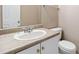 Bathroom with a white sink, vanity, and toilet at 4783 Creekside Pl, Decatur, GA 30035