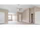 Spacious bedroom with neutral color palette and ceiling fan at 4783 Creekside Pl, Decatur, GA 30035