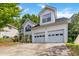Charming two-story home with an attached two car garage and private drive at 4783 Creekside Pl, Decatur, GA 30035