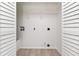 Bright laundry area with room for washer and dryer hookups and storage at 4783 Creekside Pl, Decatur, GA 30035
