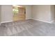 Large living room featuring neutral walls and carpet at 4783 Creekside Pl, Decatur, GA 30035