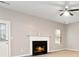 Bright living room with fireplace, neutral walls, and ceiling fan at 4783 Creekside Pl, Decatur, GA 30035