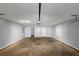 Spacious garage with concrete floor at 5514 E Stoneway Ct, Villa Rica, GA 30180