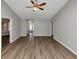 Bright living room with updated flooring and neutral paint at 5514 E Stoneway Ct, Villa Rica, GA 30180