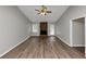 Spacious living room featuring modern flooring and a brick fireplace at 5514 E Stoneway Ct, Villa Rica, GA 30180
