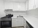 Clean kitchen featuring updated stainless steel appliances and sleek countertops at 1175 Church St # B, Decatur, GA 30030
