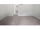 Spacious living room with neutral carpet, white walls, and ample room for furniture arrangement at 1175 Church St # B, Decatur, GA 30030