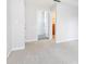 Bedroom featuring a view of the bathroom and walk-in closet at 220 Renaissance Ne Pkwy # 1105, Atlanta, GA 30308