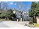 Attractive gated community entrance with lush landscaping and signage at 220 Renaissance Ne Pkwy # 1105, Atlanta, GA 30308