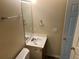 A full bathroom with a mirror, vanity, and toilet at 2850 Cedar Trace Dr, Ellenwood, GA 30294