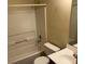 Bathroom features a shower-tub combo and a single sink vanity at 2850 Cedar Trace Dr, Ellenwood, GA 30294