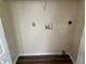 Laundry room with hookups and shelving at 2850 Cedar Trace Dr, Ellenwood, GA 30294