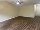 Spacious living room with hardwood floors perfect for entertaining at 2850 Cedar Trace Dr, Ellenwood, GA 30294