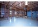 Unfinished basement featuring wood ceilings and framing at 3020 Whitfield Ave, Cumming, GA 30040