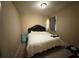 Comfortable bedroom with neutral colors, plush bedding, and a cozy atmosphere at 3020 Whitfield Ave, Cumming, GA 30040