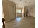 Open landing space with wood floors and a decorative wrought iron railing at 3020 Whitfield Ave, Cumming, GA 30040