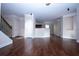 Spacious living room with hardwood floors, bright lighting, and open concept design at 3020 Whitfield Ave, Cumming, GA 30040