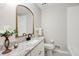 Stylish bathroom featuring granite counters, white cabinets, and modern fixtures at 2270 Old Concord Se Dr, Covington, GA 30016